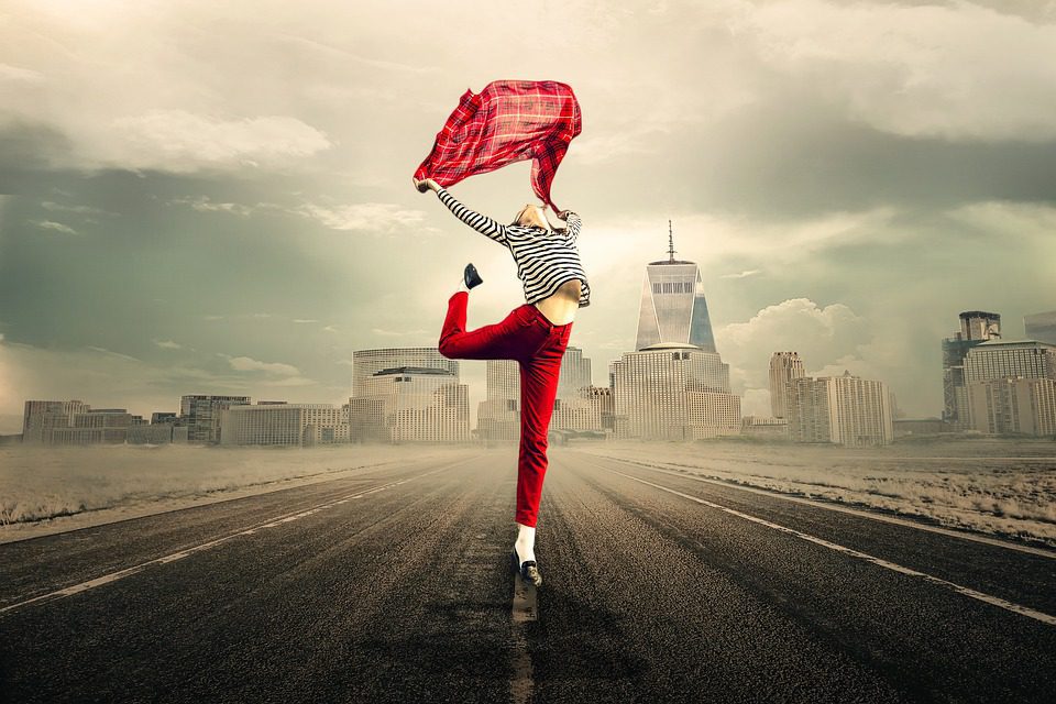 Lady standing on deserted road
