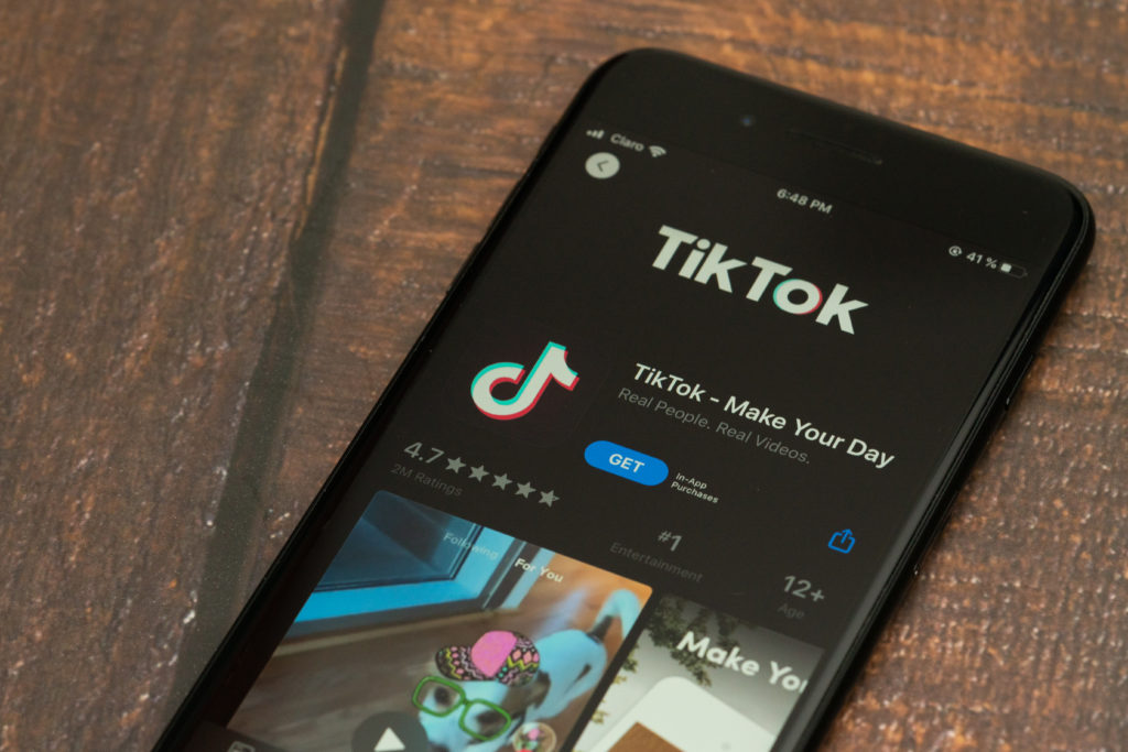 tiktok-application-logo-phone-with-logo-bottom
